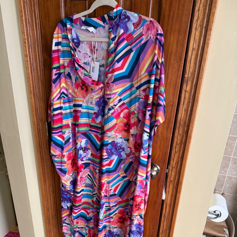 Nat johnny was long  caftan